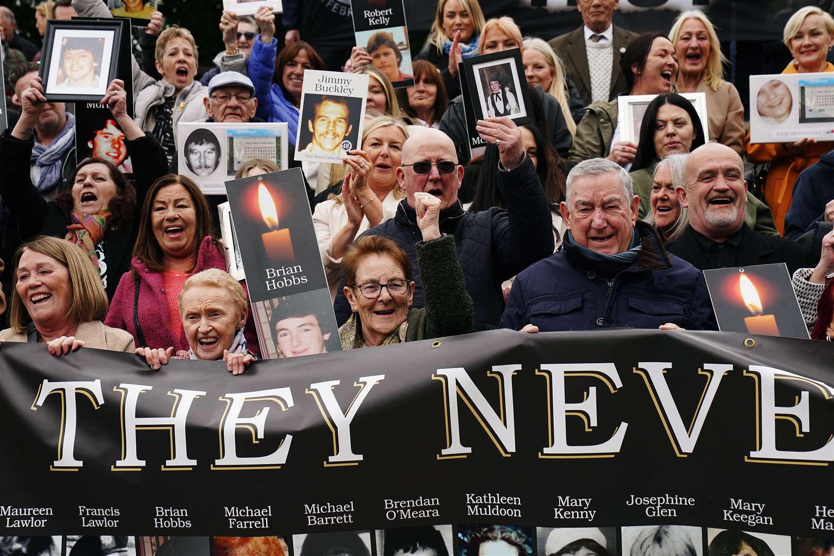 Survivors, family members and supporters in the garden of remembrance in Dublin after a verdict of unlawful killing was returned by the jury in the Stardust fire inquests (Brian Lawless/PA)
